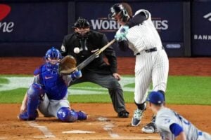 Game 5, Oct. 30, 2024: New York Yankees' Aaron Judge hits a two-run home run in the first inning of the World Series against the Los Angeles Dodgers at Yankee Stadium.