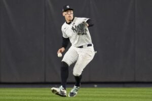 New York Yankees center fielder Aaron Judge makes error fielding on a ball hit by Los Angeles Dodgers’ Tommy Edman during the fifth inning in Game 5 of the baseball World Series, Wednesday, Oct. 30, 2024, in New York.