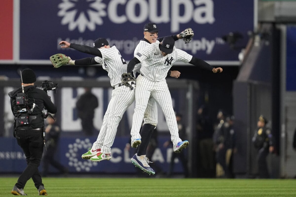 From left to right, Alex Verdugo, Aaron Judge and Juan Soto celebrate after Game 1 of the baseball AL Championship Series against the Cleveland Guardians Monday, Oct. 14, 2024, in New York. The Yankees won 5-2. 