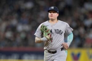 CHICAGO, ILLINOIS - AUGUST 12: Alex Verdugo of the New York Yankees jogs off the field in a game against the Chicago White Sox at Guaranteed Rate Field on August 12, 2024 in Chicago, Illinois.