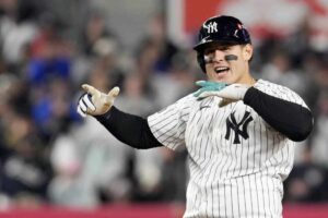 New York Yankees’ Anthony Rizzo celebrates after hitting a RBI double against the Cleveland Guardians during the sixth inning in Game 2 of the baseball AL Championship Series Tuesday, Oct. 15, 2024, in New York.