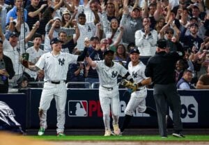 Yankees' Austin Wells and Jazz Chisholm celebrate thw ALDS Game 1 win over the Royals in New York on Oct. 5, 2024.