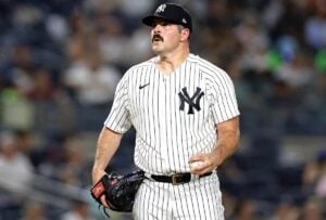 New York Yankees starting pitcher Carlos Rodon reacts while throwing against the Cleveland Guardians during the sixth inning in Game 1 of the baseball AL Championship Series Monday, Oct. 14, 2024, in New York.