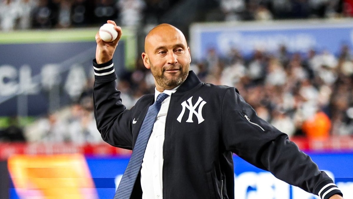 Yankees legend Derek Jeter throws the ceremonial first pitch on October 28, 2024, before Game 3 of the World Series between the Yankees and Dodgers at Yankee Stadium in New York.