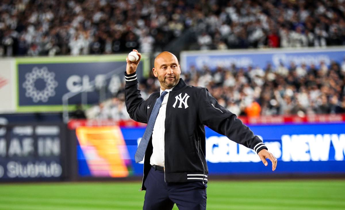 Yankees legend Derek Jeter throws the ceremonial first pitch on October 28, 2024, before Game 3 of the World Series between the Yankees and Dodgers at Yankee Stadium in New York.