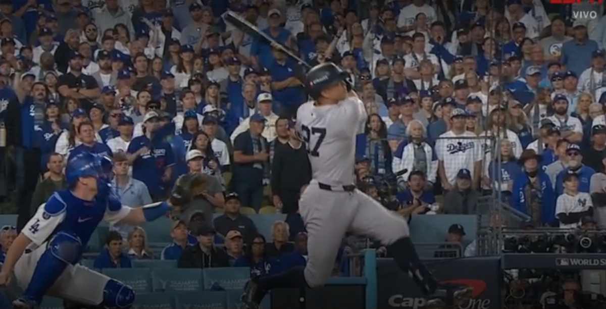 "On October 25, 2024, Giancarlo Stanton watches his record-breaking home run soar for 6.54 seconds, securing a 2-1 lead for the Yankees in Game 1 of the World Series at Dodger Stadium."