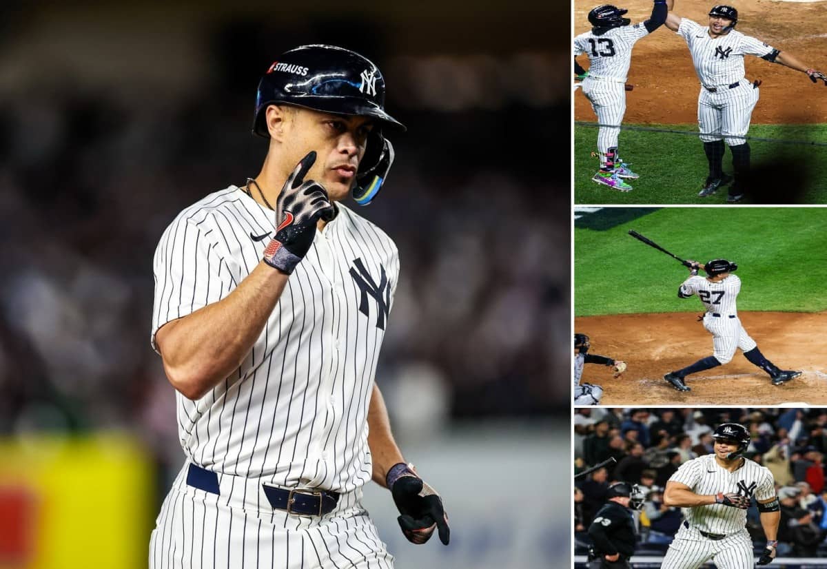 New York Yankees’ Giancarlo Stanton, center, hits a home run off Cleveland Guardians relief pitcher Erik Sabrowski (62) during the seventh inning in Game 1 of the baseball AL Championship Series Monday, Oct. 14, 2024, in New York.