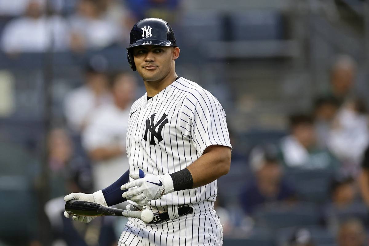 Yankees rookie Jasson Dominguez in action during a late-season game, looking to earn a role in the ALDS