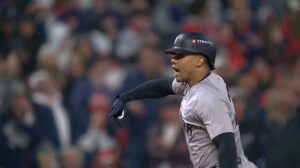 New York Yankees’ Juan Soto hitting a three-run home run against the Cleveland Guardians during the 10th inning in Game 5 of the baseball AL Championship Series Saturday, Oct. 19, 2024, in Cleveland.