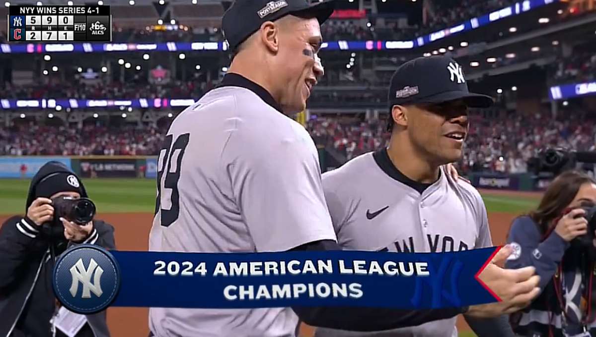 Juan Soto celebrates with Aaron Judge after hitting a three-run home run in the top of the 10th inning to give New York a 5-2 lead over Cleveland. 