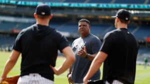 Yankees' bullpen coach Mike Harkey with his pitchers at Dodgers Stadium on Oct. 24, 2024.