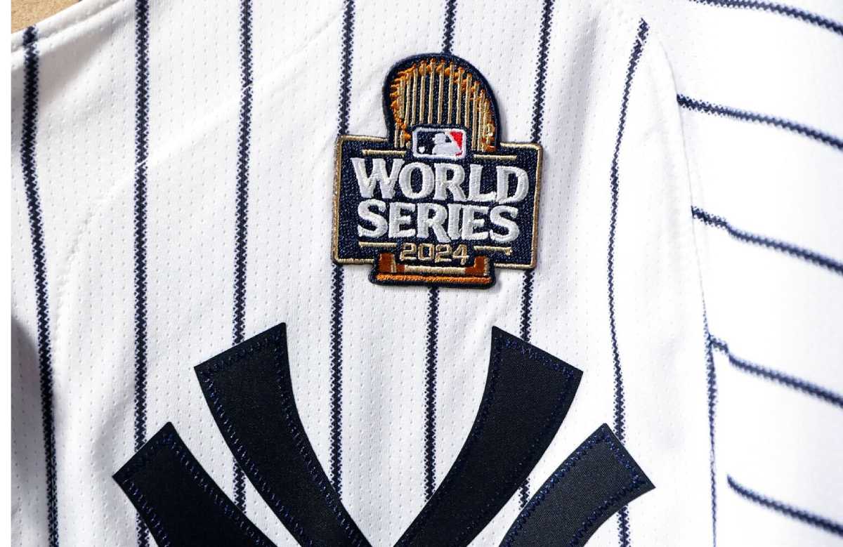 A Yankees shirt featuring the 2024 World Series patch,