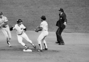 Unknown Yankees player in action against a Dodgers player during the 1978 World Series