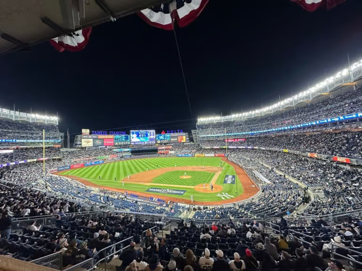 Yankees fans begin to exit Yankee Stadium during the ninth inning on October 28, 2024, as the team trails 2-4 against the Dodgers in World Series Game 3