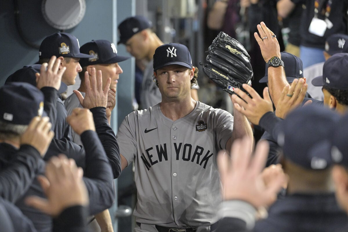 Yankees ace Gerrit Cole returns to dugout after pitching against the Dodgers on Oct. 25, 2024 in Los Angeles.