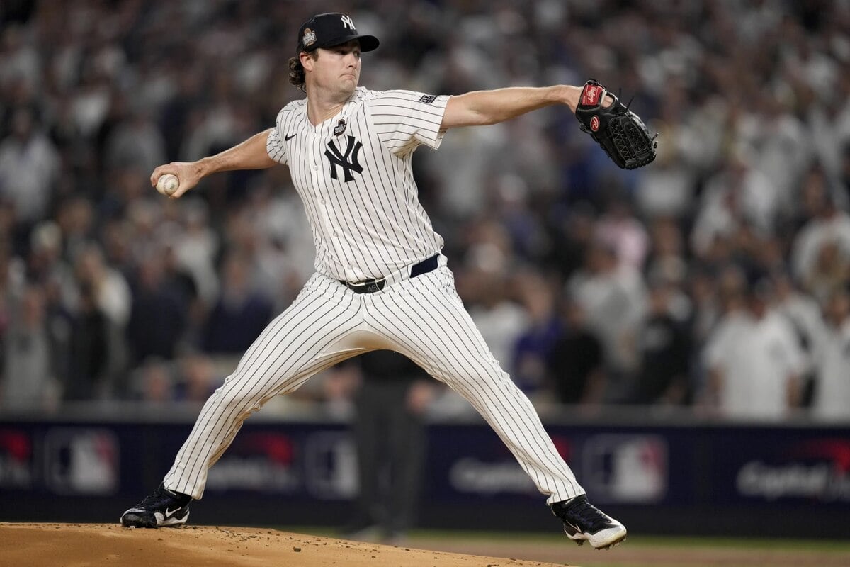 New York Yankees pitcher Gerrit Cole throws against the Los Angeles Dodgers during the first inning in Game 5 of the baseball World Series, Wednesday, Oct. 30, 2024, in New York.