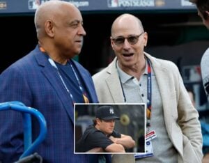 Yankees general manager Brian Cashman with assistant Omar Minaya. Inset: Gerrit Cole