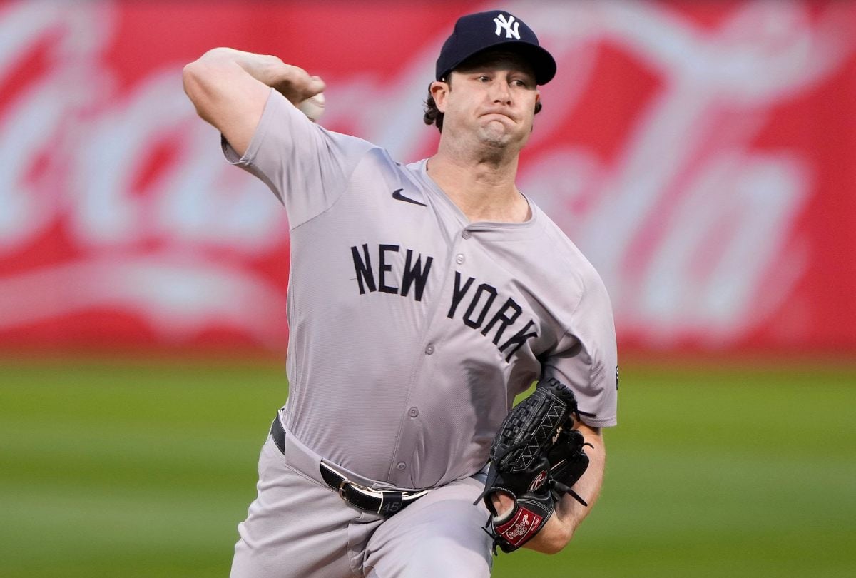 OAKLAND, CALIFORNIA - SEPTEMBER 20: Gerrit Cole #45 of the New York Yankees pitches against the Oakland Athletics in the bottom of the first inning at the Oakland Coliseum on September 20, 2024 in Oakland, California.