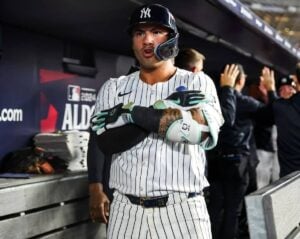 Gleyber Torres celebrates in dug out as the Yankees beat the Royals 6-5 at Yankee Stadium on Oct. 5, 2024.