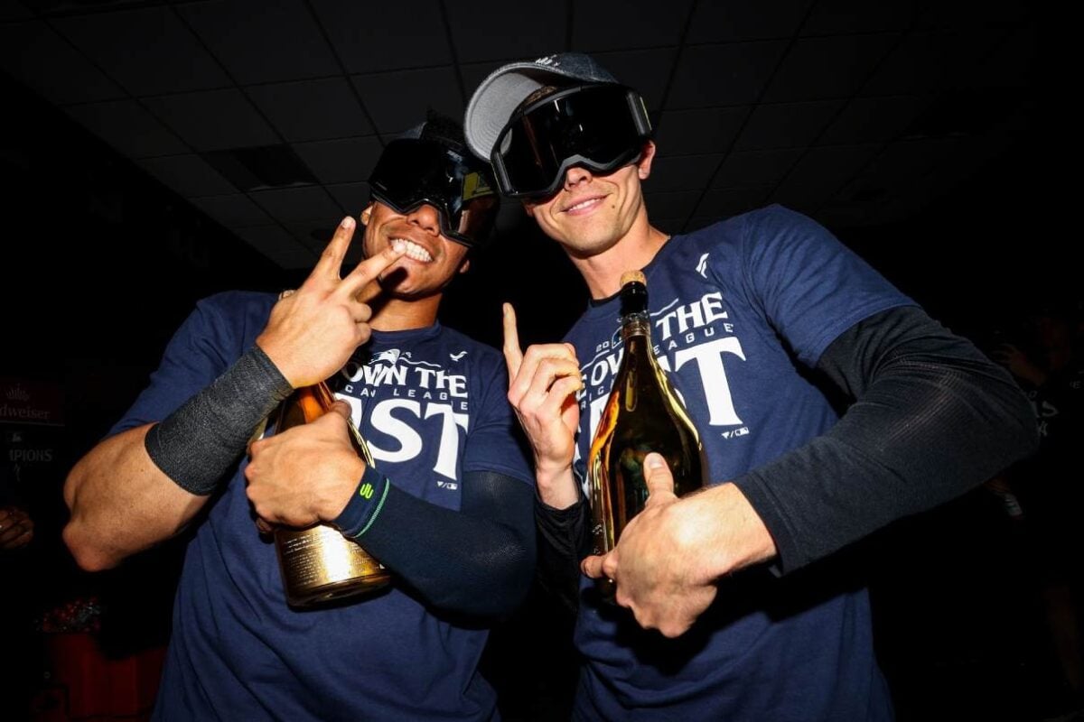 Luke Weaver and Juan Soto celebrating after winning the AL trophy in October.