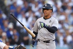 LOS ANGELES, CALIFORNIA - OCTOBER 25: Juan Soto #22 of the New York Yankees tosses his bat after drawing a walk in the first inning against the Los Angeles Dodgers during Game One of the 2024 World Series at Dodger Stadium on October 25, 2024 in Los Angeles, California.