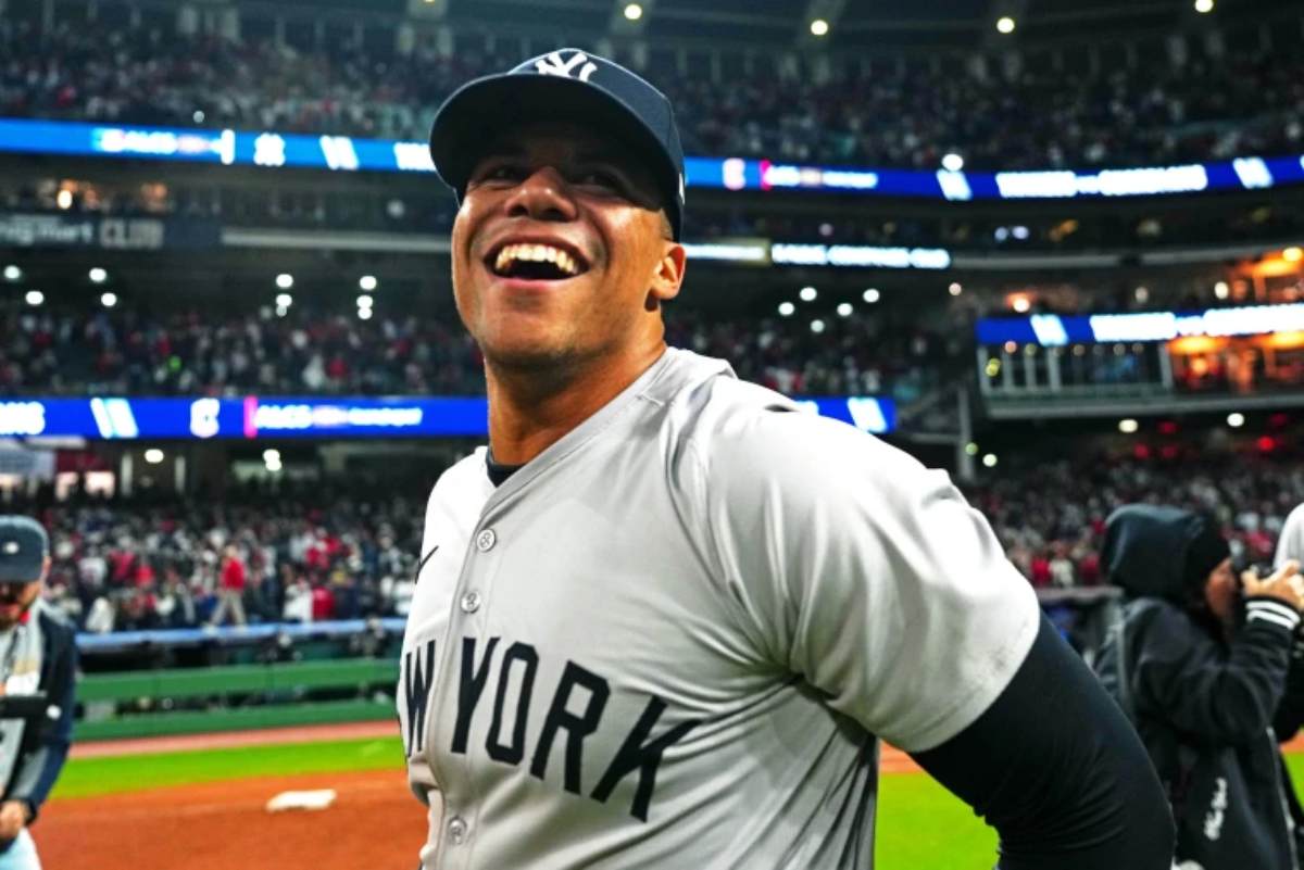 OS ANGELES, CALIFORNIA - OCTOBER 25: Juan Soto #22 of the New York Yankees tosses his bat after drawing a walk in the first inning against the Los Angeles Dodgers during Game One of the 2024 World Series at Dodger Stadium on October 25, 2024 in Los Angeles, California.