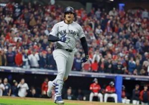 LOS ANGELES, CALIFORNIA - OCTOBER 25: Juan Soto #22 of the New York Yankees tosses his bat after drawing a walk in the first inning against the Los Angeles Dodgers during Game One of the 2024 World Series at Dodger Stadium on October 25, 2024 in Los Angeles, California.