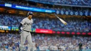 Yankees' Juan Soto tosses his bat after drawing a walk against the Dodgers in Game 1 of the 2024 World Series at Dodger Stadium on October 25, 2024.