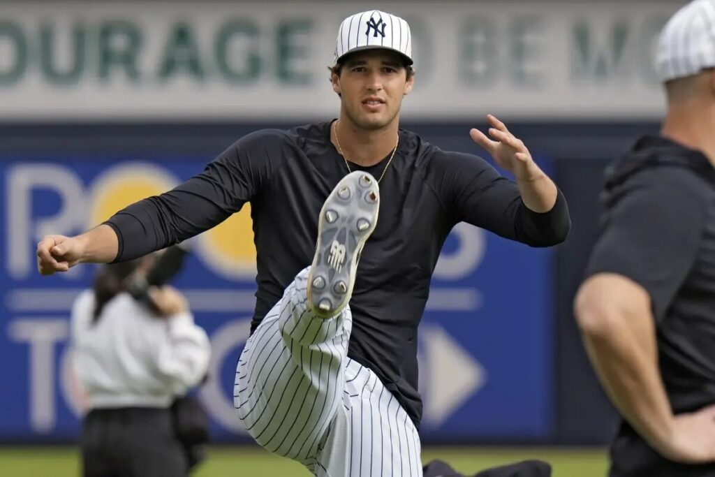 Spencer Jones in action for the New York Yankees minor league team, showcasing his impressive hitting skills