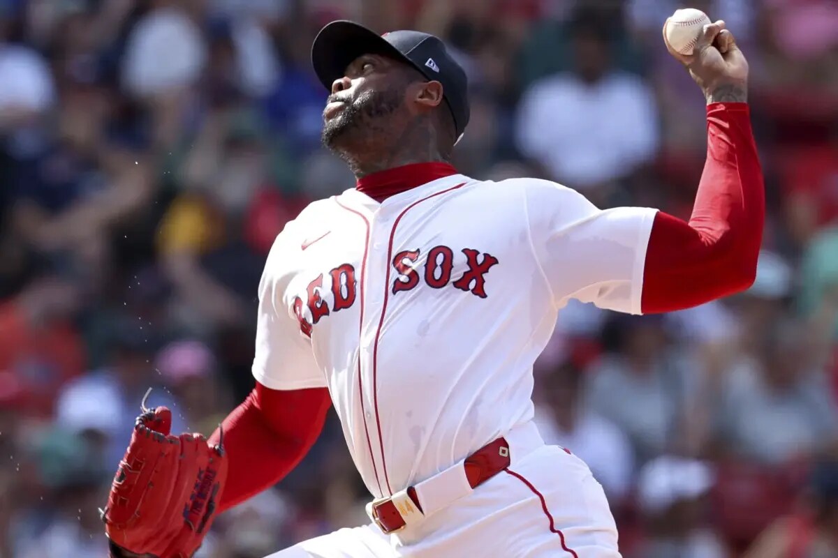 Boston Red Sox pitcher Aroldis Chapman throws during the ninth inning of a baseball game against the Toronto Blue Jays, Sunday, June 29, 2025, in Boston.
