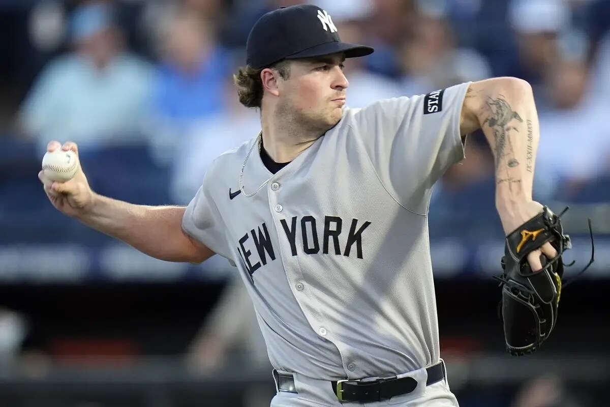 New York Yankees pitcher Cam Schlittler delivers to the Tampa Bay Rays during the first inning of a baseball game Wednesday, Aug. 20, 2025, in Tampa, Fla.