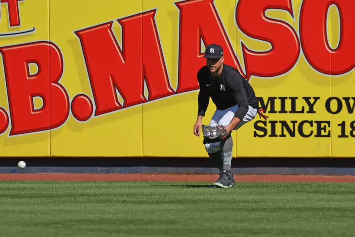 Giancarlo Stanton fielding ground balls in the outfield on Aug. 8, 2025. 