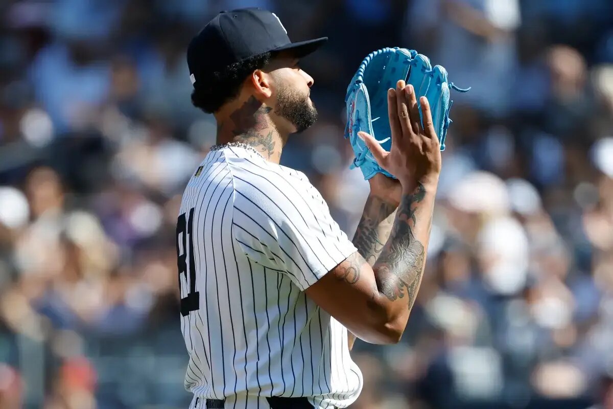 Luis Gil claps his mitt after he is pulled from the game in the sixth inning of the Yankees’ win over the Astros.