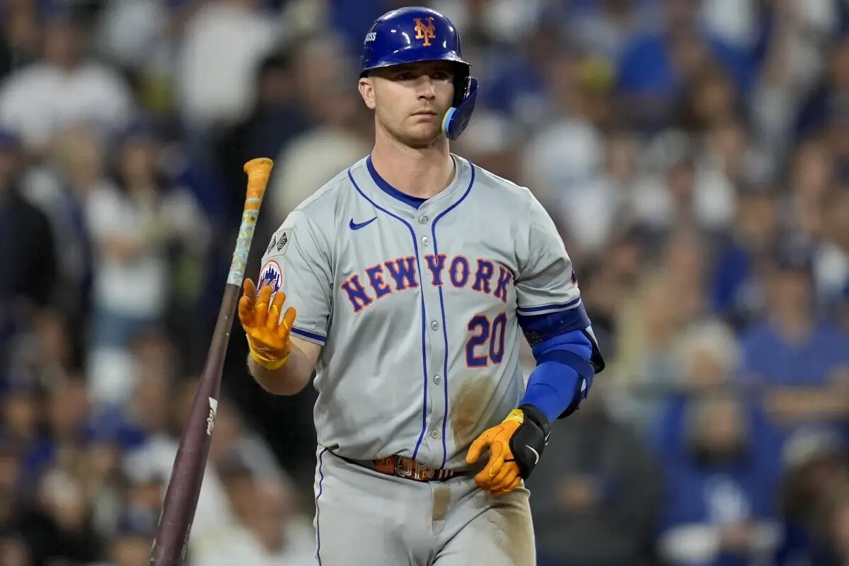 New York Mets’ Pete Alonso heads to first base after a walk in the fourth inning against the Los Angeles Dodgers in Game 1 of a baseball NL Championship Series, Sunday, Oct. 13, 2024, in Los Angeles.