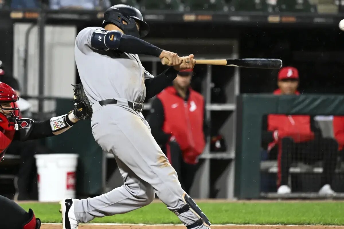 New York Yankees’ Trent Grisham hits a grand slam during the fourth inning of a baseball game against the Chicago White Sox, Friday, Aug. 29, 2025, in Chicago.
