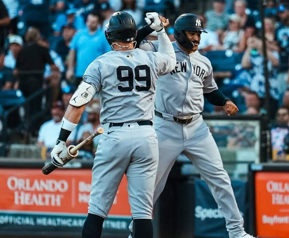 Aaron Judge and Trent Grisham celebrate after the latter's home run in the Yankees' 6-4 win over the Rays in Tampa on August 20, 2025.