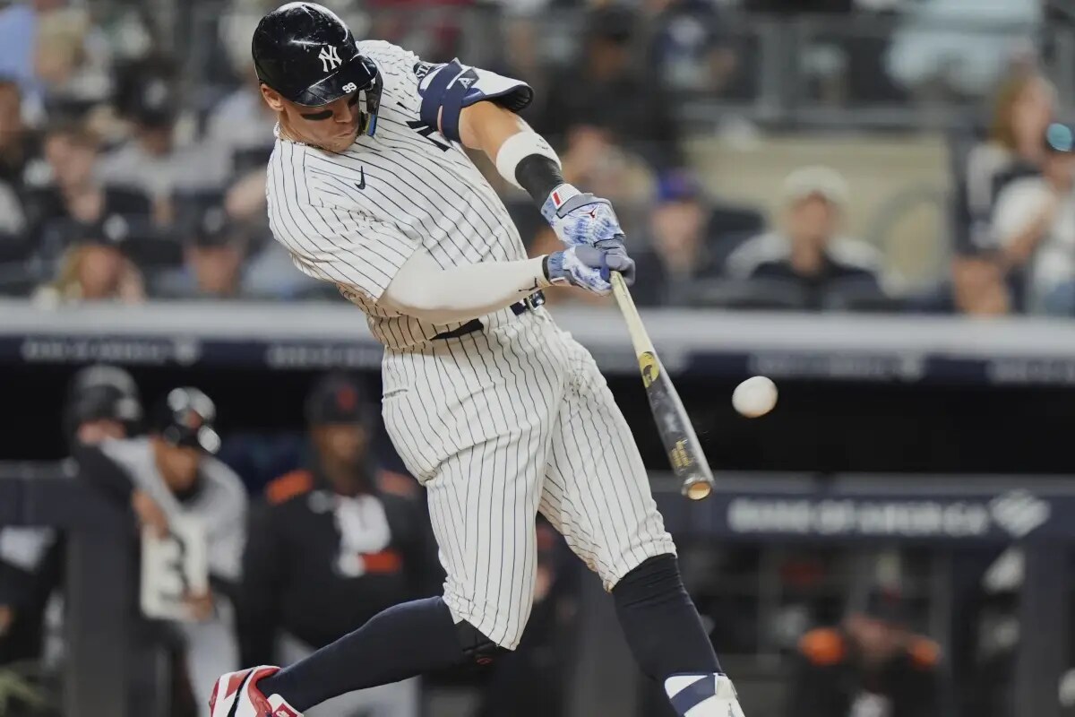 New York Yankees’ Aaron Judge hits a home run during the third inning of a baseball game against the Detroit Tigers Thursday, Sept. 11, 2025, in New York.