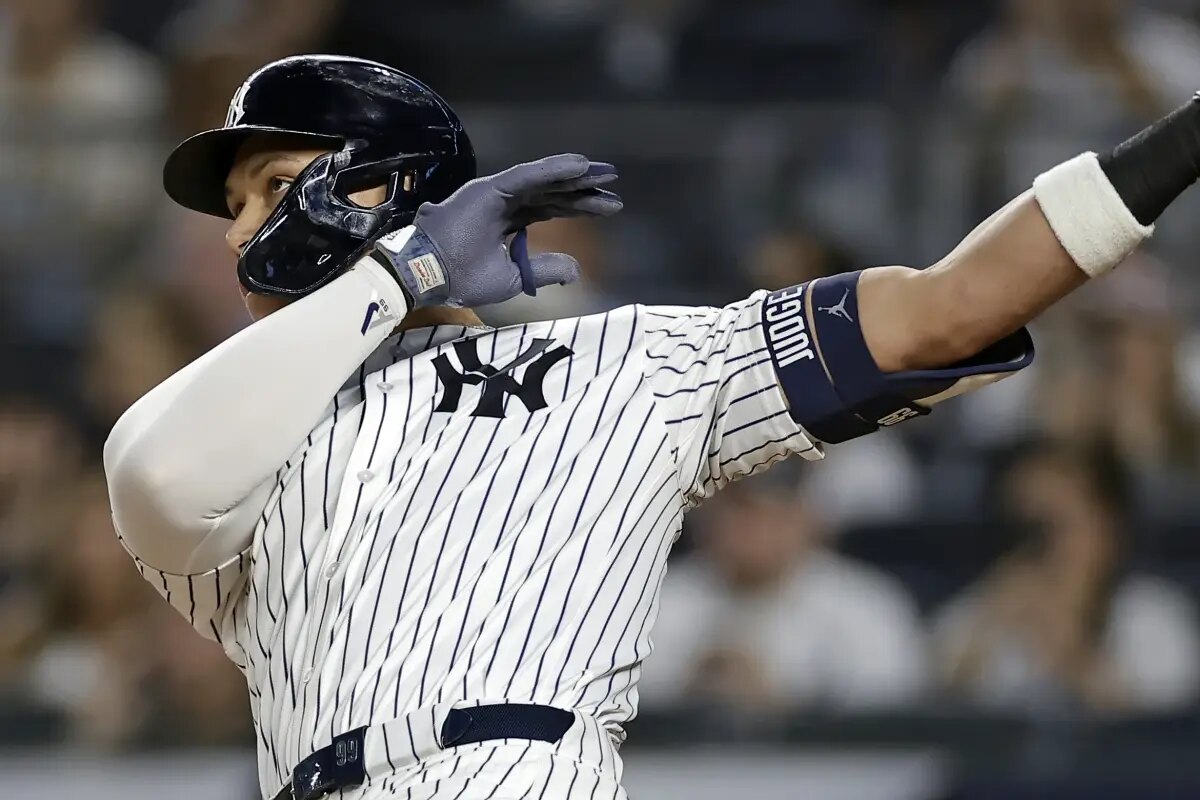 New York Yankees’ Aaron Judge hits a home run during the first inning of a baseball game against the Detroit Tigers, Thursday, Sept. 11, 2025, in New York.