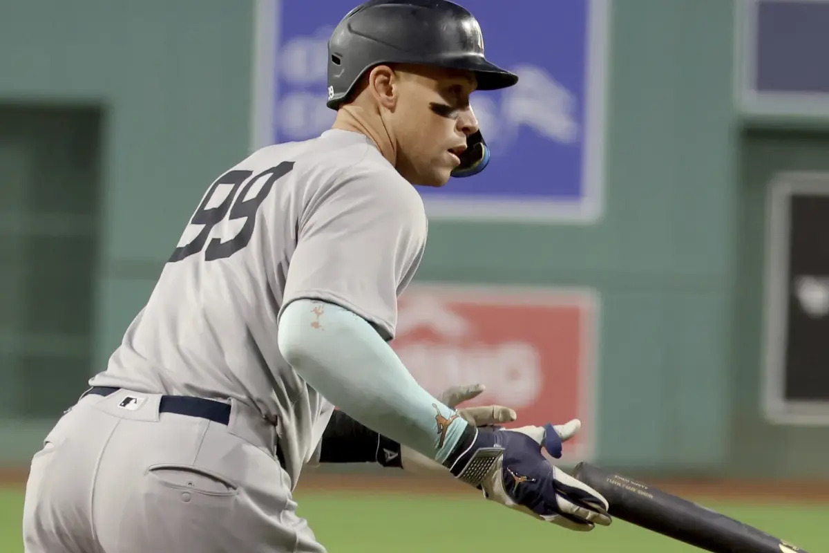 New York Yankees designated hitter Aaron Judge drops the bat after hitting a home run during the first inning of a baseball game against the Boston Red Sox, Friday, Sept. 12, 2025, in Boston.