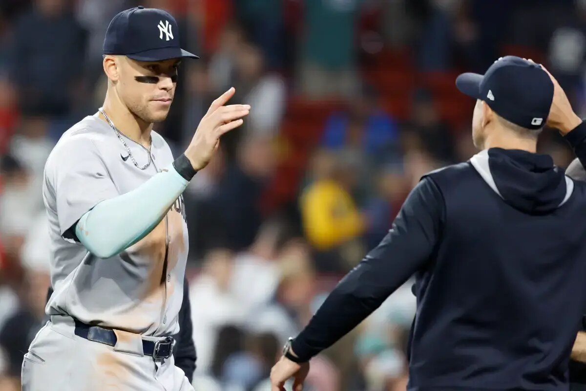 Aaron Judge and the Yankees celebrate their win.