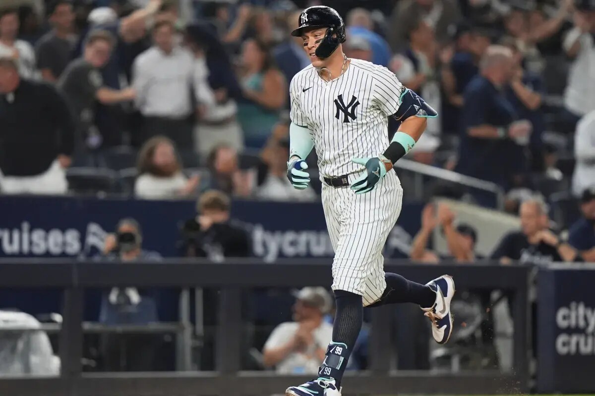 New York Yankees’ Aaron Judge runs the bases after hitting a three-run home run during the second inning of a baseball game against the Chicago White Sox Wednesday, Sept. 24, 2025, in New York.