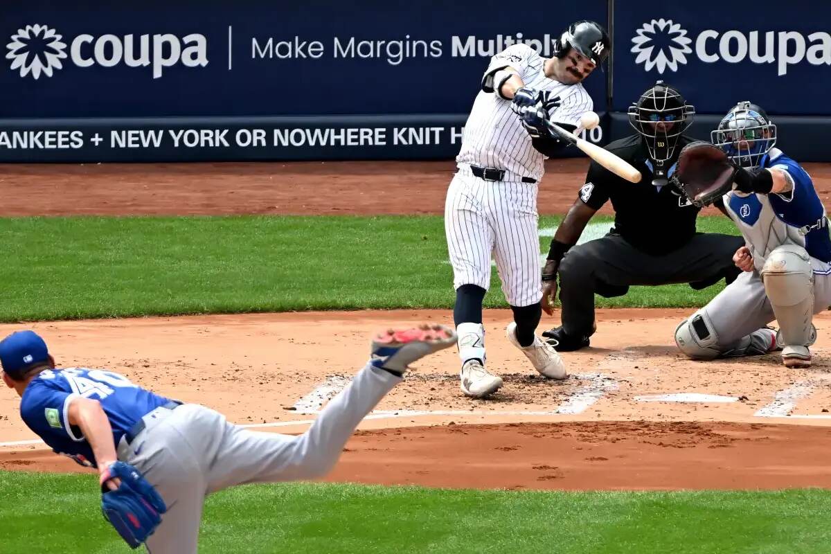 Austin Wells hits a sacrifice fly during the Yankees’ Sept. 6 win against the Blue Jays.