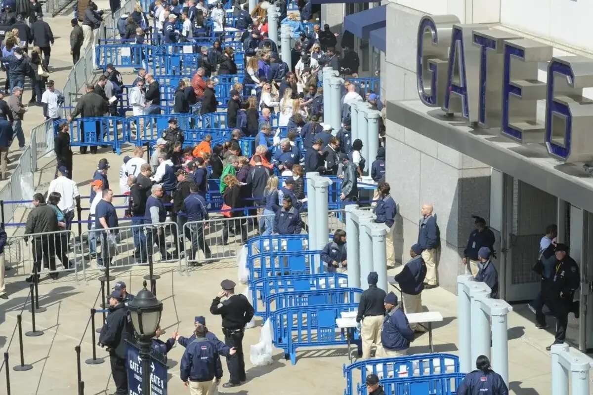 Increased security creates long lines at Yankee Stadium on Opening Day.