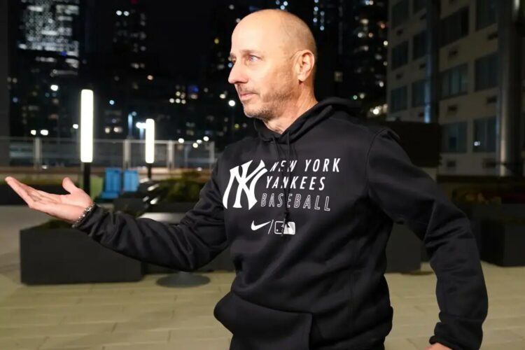Yankees GM Brian Cashman at the annual sleep out charity event at Covenant House.
