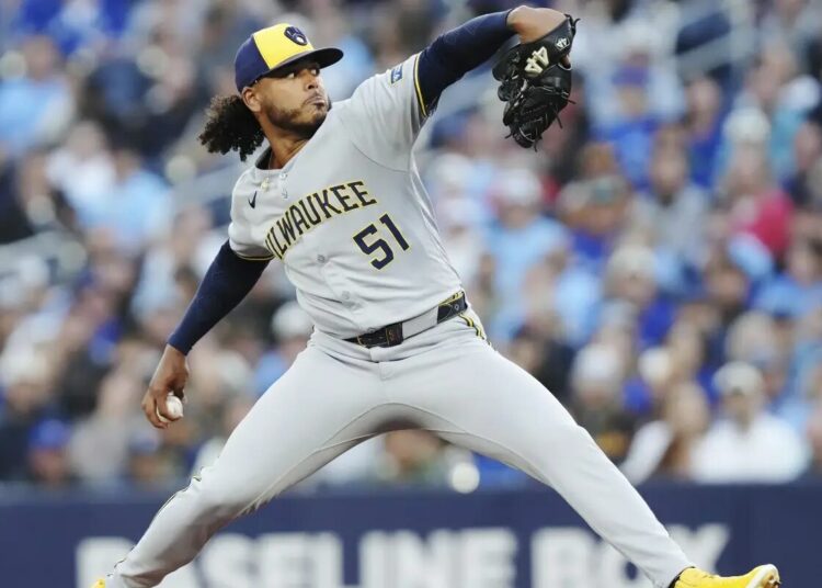 Milwaukee Brewers pitcher Freddy Peralta (51) works against the Toronto Blue Jays during first inning MLB baseball action in Toronto on Friday, August 29, 2025.