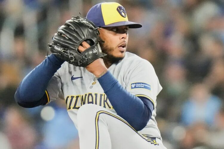 Milwaukee Brewers pitcher Freddy Peralta (51) works against the Toronto Blue Jays during the sixth inning of a baseball game in Toronto on Friday, Aug. 29, 2025.