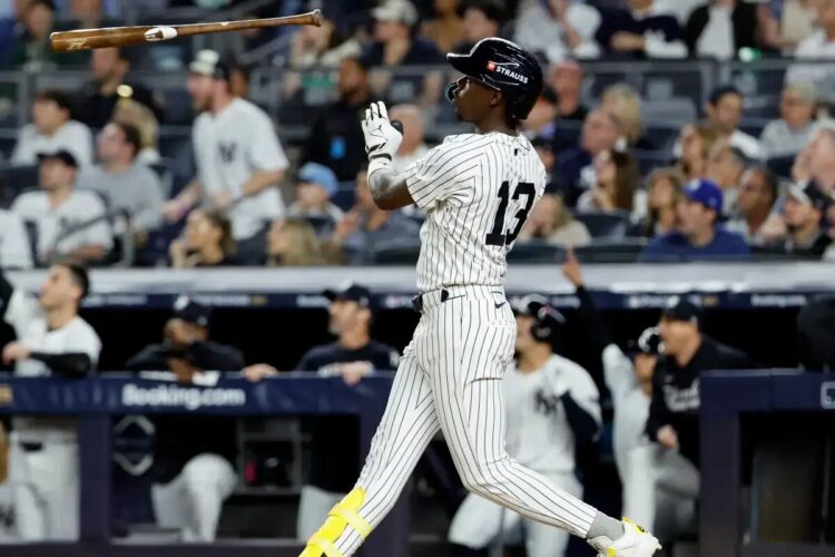 Jazz Chisholm Jr. flips his bat after he hits a solo home run to give the Yankees the lead during the fifth inning of Game 3 of the ALDS against the Toronto Blue Jays in The Bronx, New York on October 7, 2025.