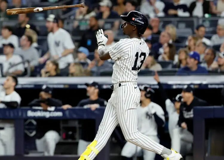 Jazz Chisholm Jr. flips his bat after he hits a solo home run to give the Yankees the lead during the fifth inning of Game 3 of the ALDS against the Toronto Blue Jays in The Bronx, New York on October 7, 2025.