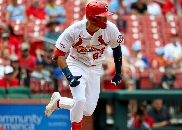 St. Louis Cardinals’ Michael Siani runs for an RBI single during the seventh inning of a baseball game against the Texas Rangers, Wednesday, July 31, 2024, in St. Louis.