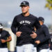 Captain Aaron Judge leads his Yankees teammates during an excercise session at the spring training camp in Tampa, Fl. Feb. 13, 2026.